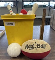 Miscellaneous bucket of balls and bowling pins
