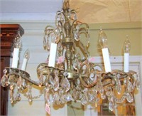 Crystal prisms and brass chandelier eight lights