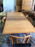 Mid-century modern dining table with six chairs