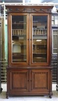 Fine French Laurel Swag Crowned Mahogany Bookcase.