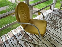 Yellow clamshell chair