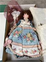 Robin Woods porcelain doll with original box
