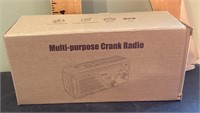 Multi-purpose crank weather alert radio