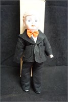 Boy Doll with Red Bowtie
