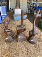 Three hardwood carved geese