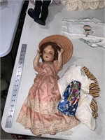antique doll and doll clothes