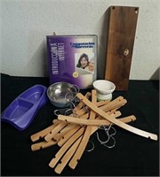 Wooden hangers, pet dishes, a wooden box, and