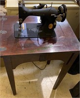 Antique Singer sewing machine, in the mahogany