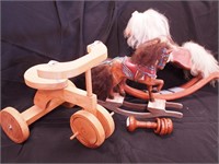 Four decorative wooden toys: two rocking horses
