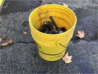 HALF A BUCKET WITH FIXTURES / CAST IRON PIECES