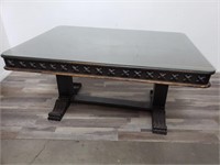 Vintage carved wood dining table with glass top