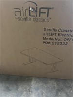 Seville airlift electric adjustable glass desk