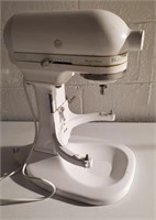 Kitchen Aid mixer with attachments.