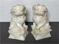 Pair of carved white marble Chinese Foo dogs