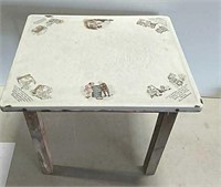 Porcelain top child's table with advertising