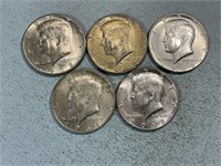 Five 1968D Kennedy half dollars