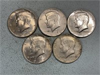 Five 1966 Kennedy half dollars