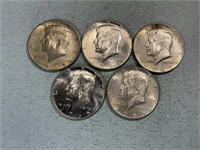 Five 1965 Kennedy half dollars