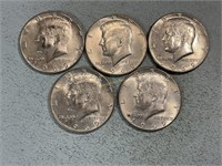 Five 1969D Kennedy half dollars