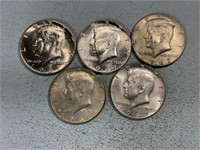 Five 1967 Kennedy half dollars
