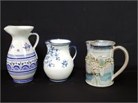 Group of 3 handmade pottery pitchers, signed