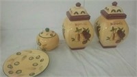 3 decorative ceramic containers with plate