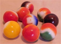 Nine 1940's glass shooter marbles