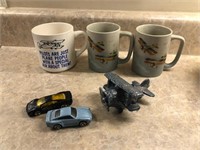 Lot of airplane mugs and cars
