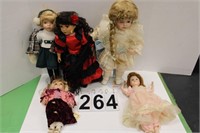 5 Porcelain Dolls 1 w/ Red & Black Dress