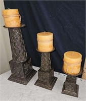 set of candle holders with candles