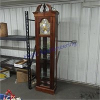 Grandmother clock -- Cracked glass on side