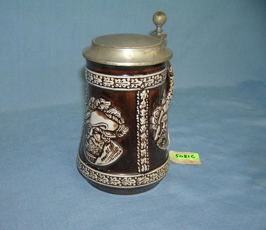 Vintage beer stein with 3 historical figures