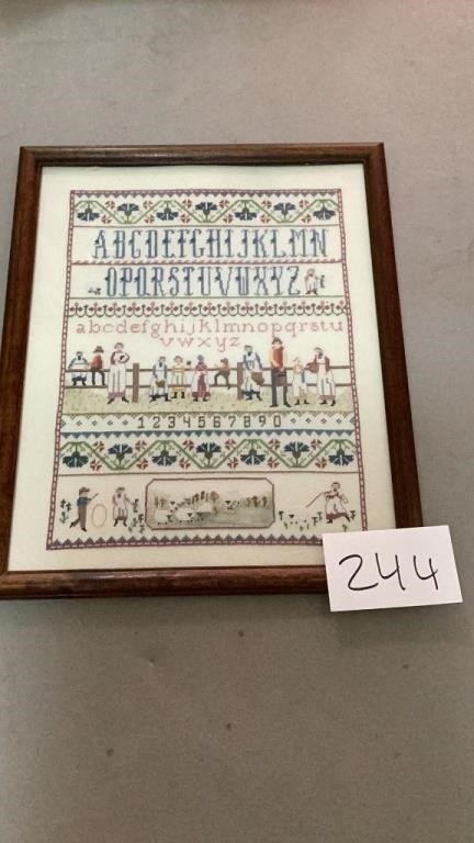 Crosstitch framed art measures approximately 18