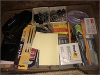Misc office supplies; post its, stapler, staples