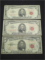 Three 1963 $5 Red Seal US paper money bills