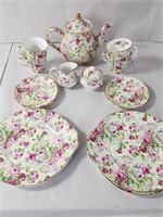 Vintage four-person floral tea set and plates