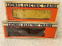 2 LIONEL TRAIN CARS