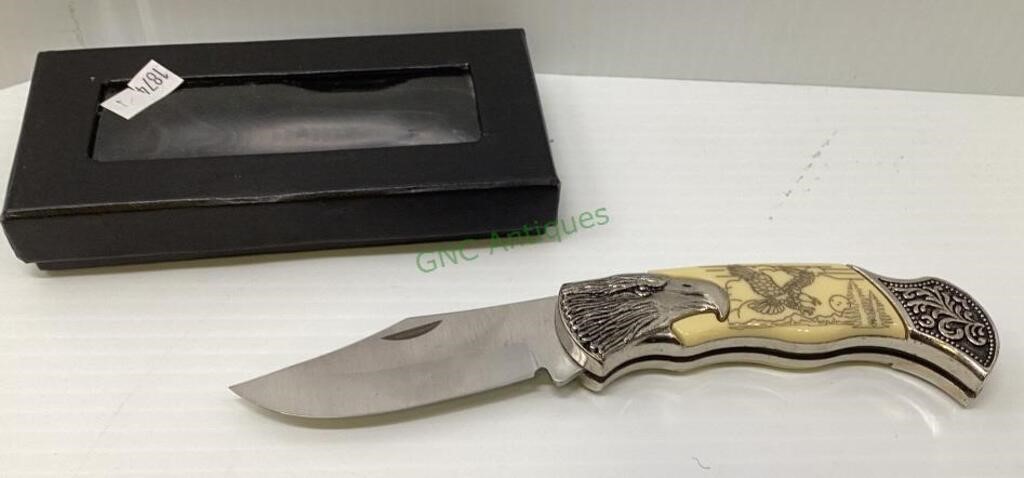 Pocket knife with eagle motif has a 3 inch