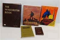 Various firearm books including "The Winchester