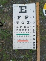 Cardboard eye exam sign