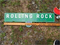 Tin rolling rock sign