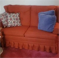 Rust colored love seat