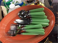 Service for six green handled utensils