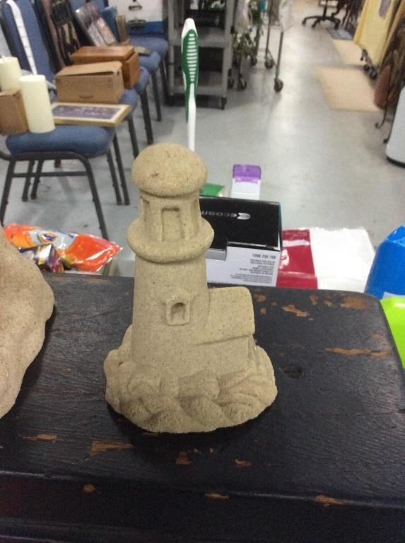 Sand sculptured lighthouse