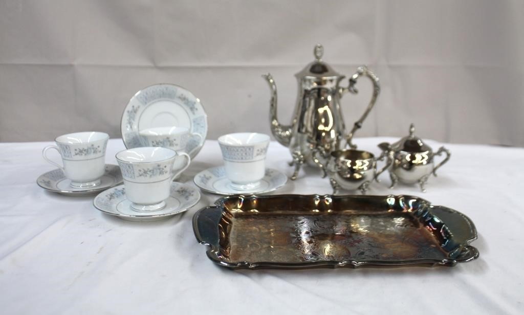 Four fine china Liling teacups & saucers,