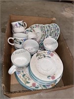 Missing one saucer, eight piece set of dishes