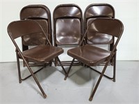 Eleven commercial metal folding chairs