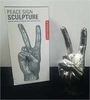 New 7.75-in peace sign sculpture