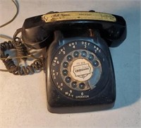 Black rotary dial telephone