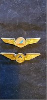 Piedmont and Delta airlines advertising pins.